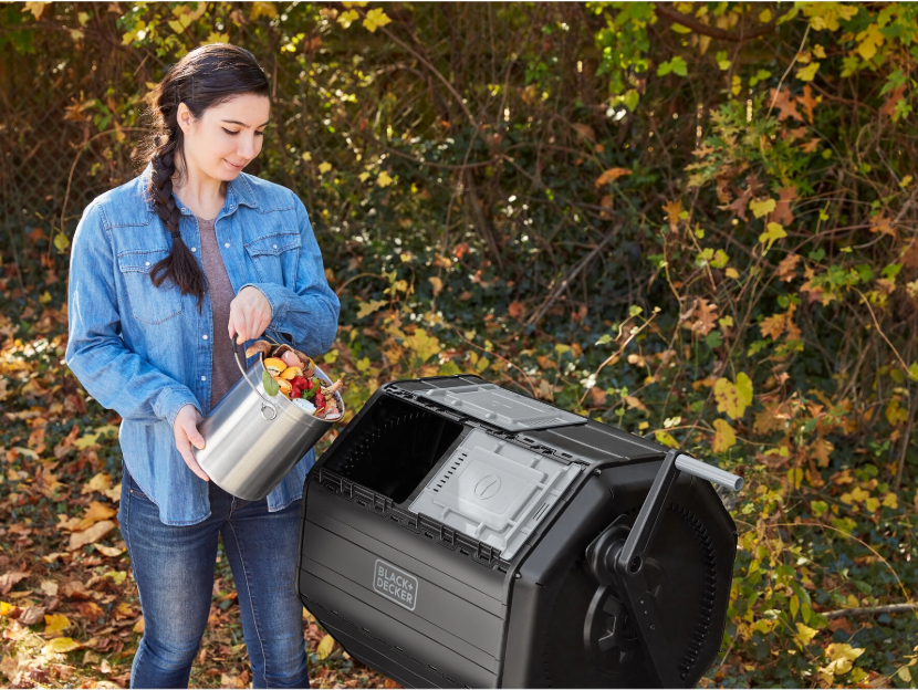 Woman using Black-and-decker composter