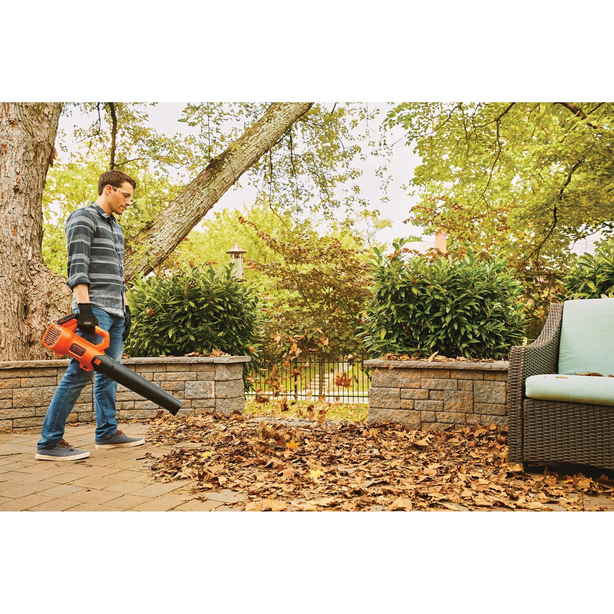Man using cordless leaf blower