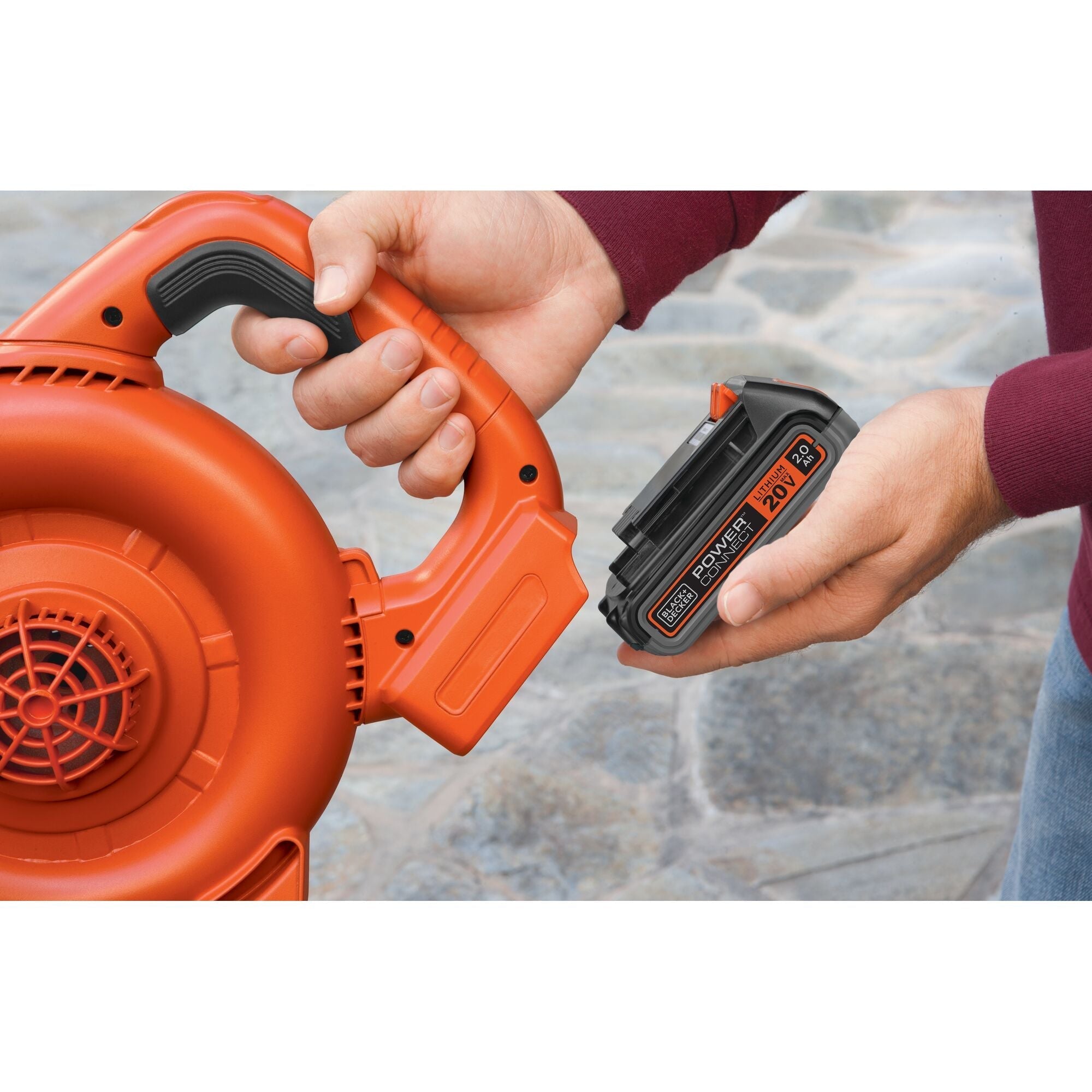 Person installing Black-and-decker 20V battery