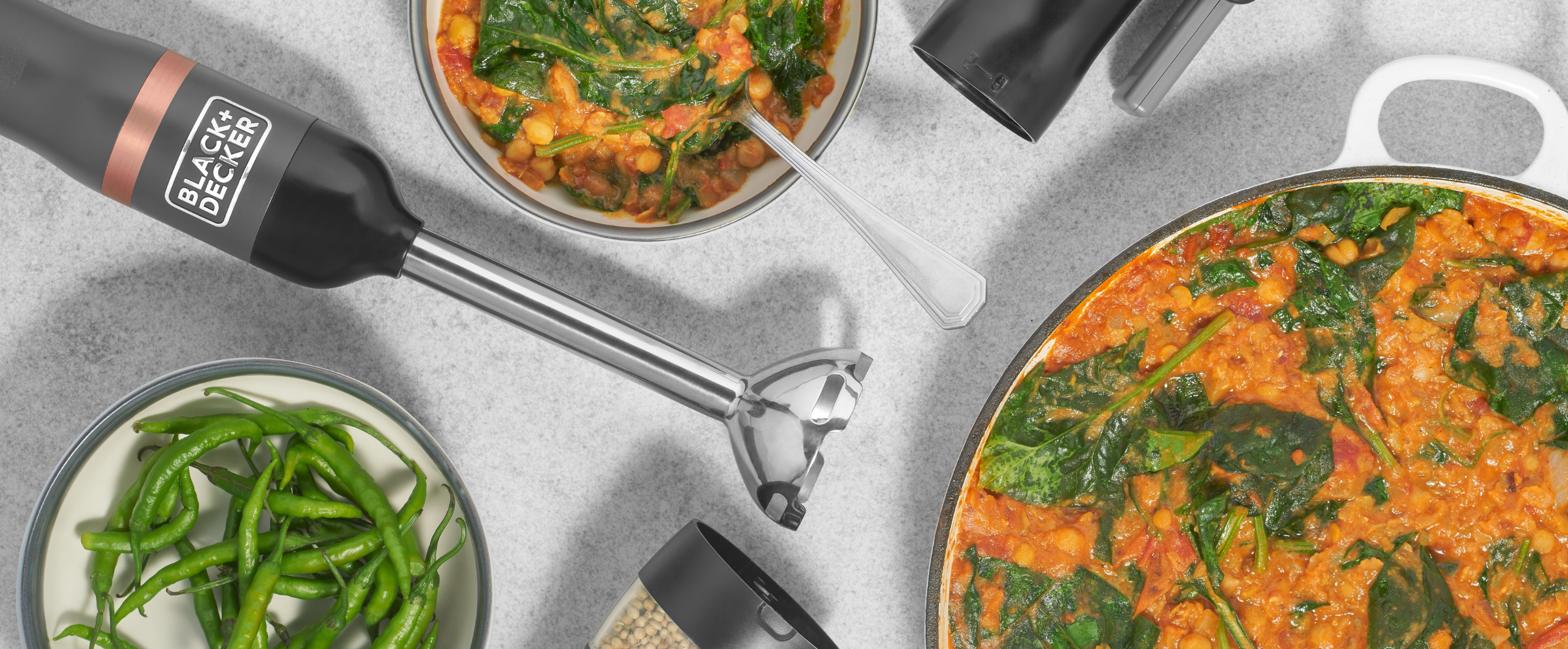 Grey, Black-and-decker kitchen wand attachments next to chickpea and lentil dahl