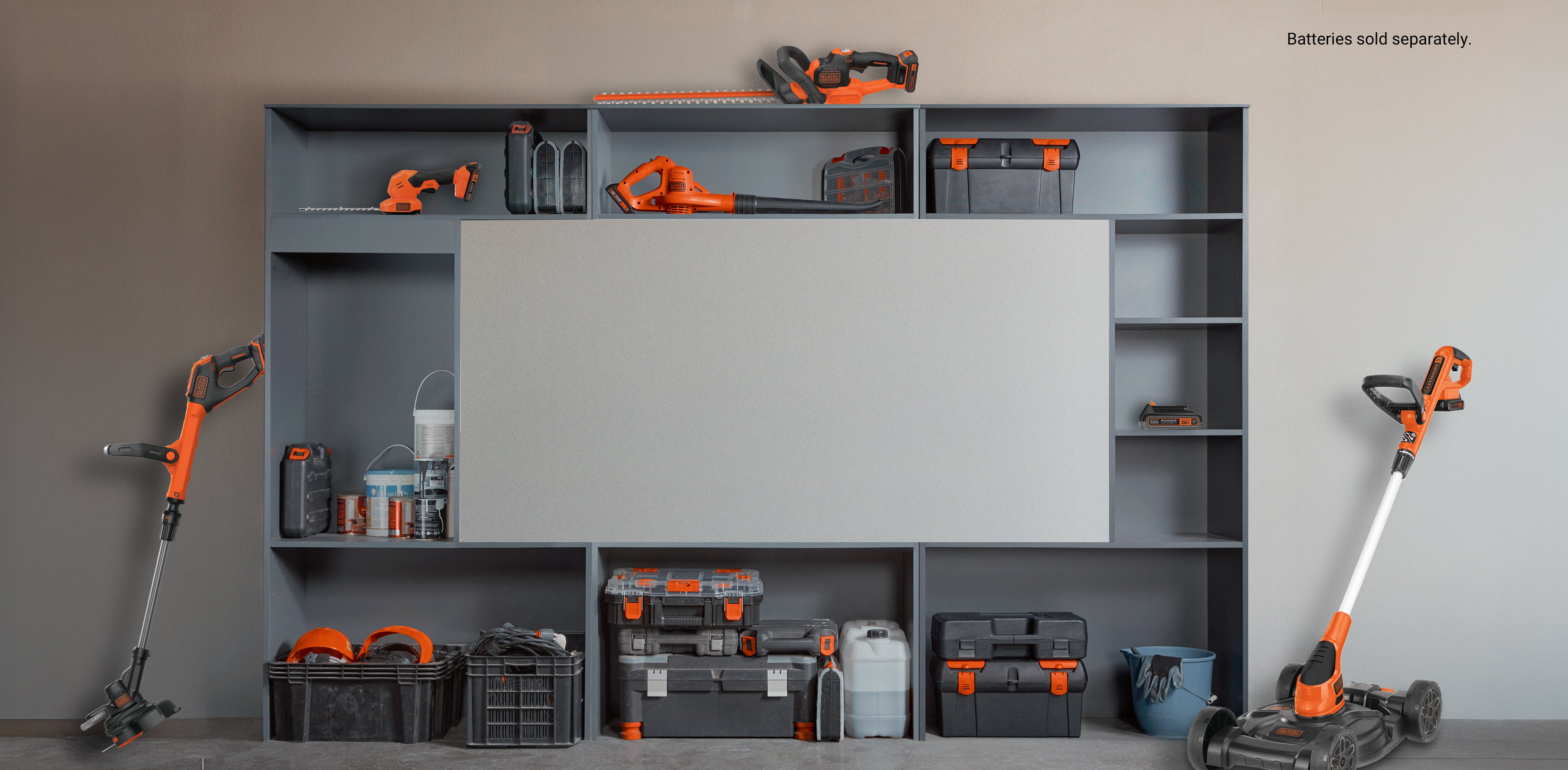 Collection of Black-and-decker products in a garage