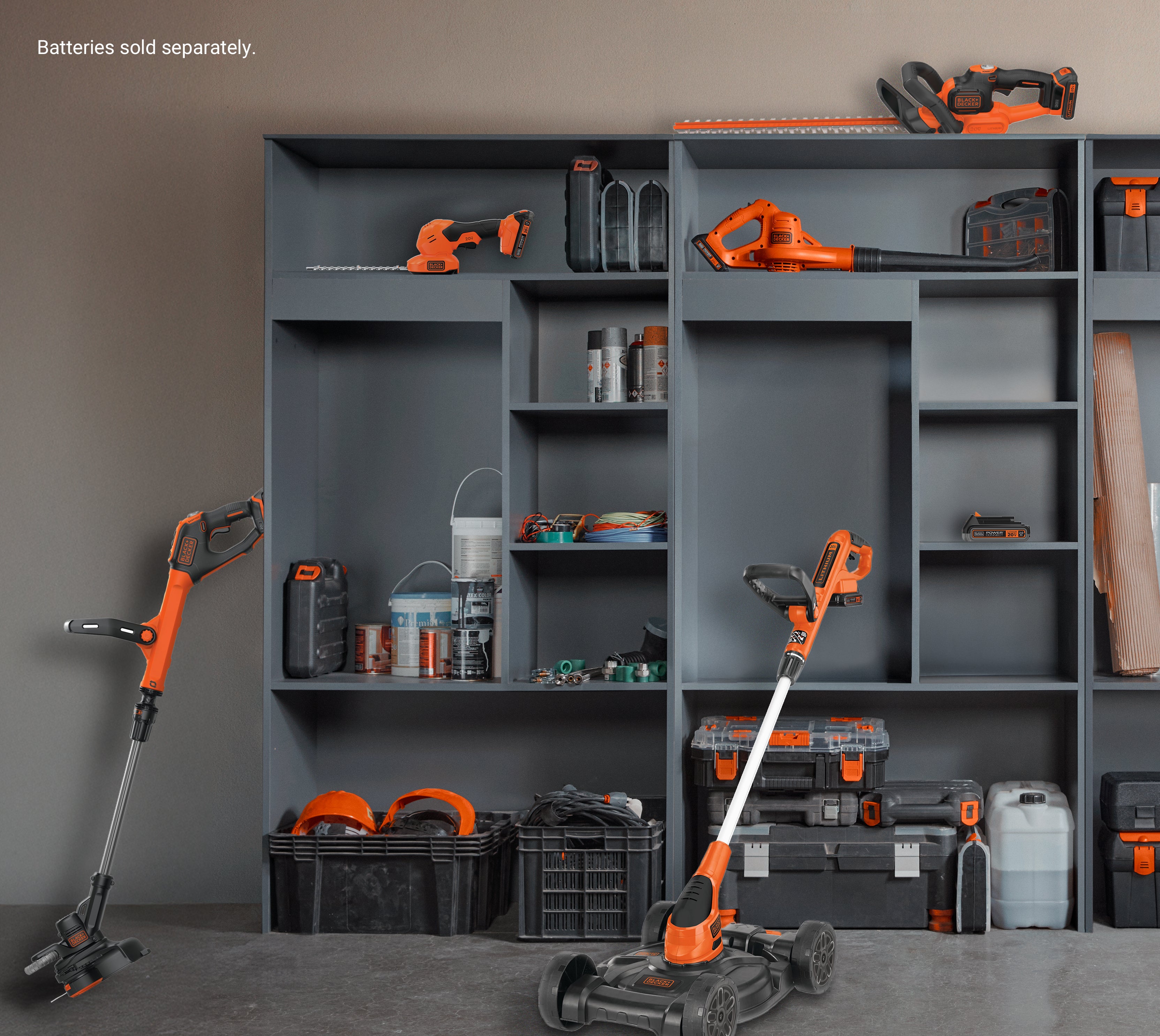 Collection of Black-and-decker products in a garage