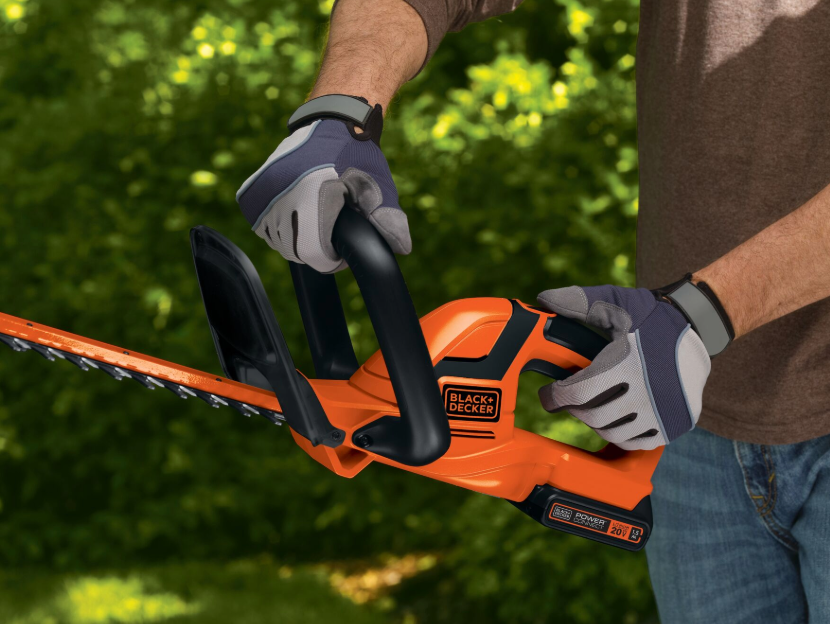 up close shot of Black-and-decker hedge trimmer, cordless