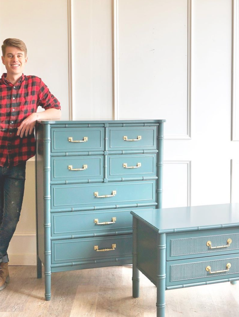 Man next to upcycled furniture in blue