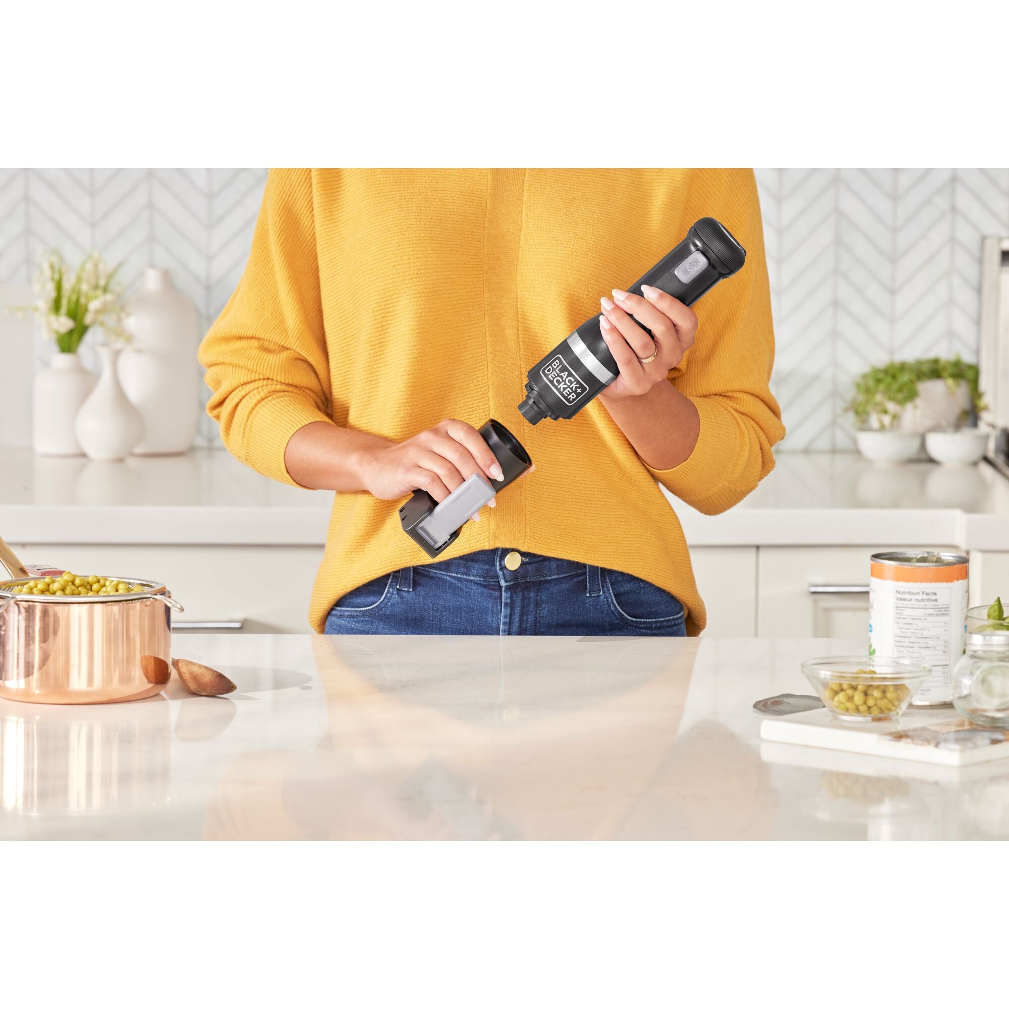 Lever pulled fully down on the can opener attachment of the Black-and-decker kitchen wand system