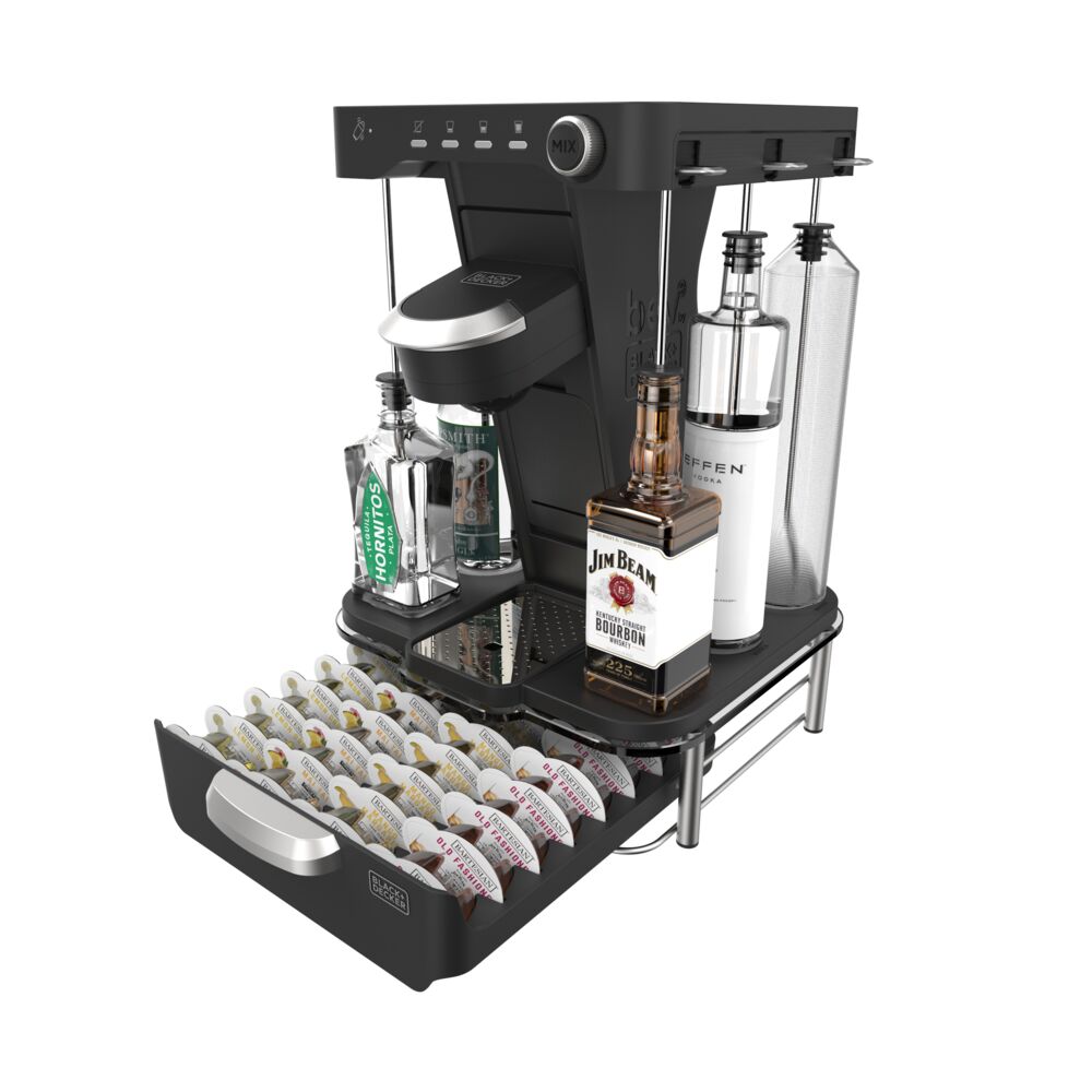 3/4 view of the bev by Black-and-decker™ cocktail maker sitting on top of an open filled capsule storage drawer