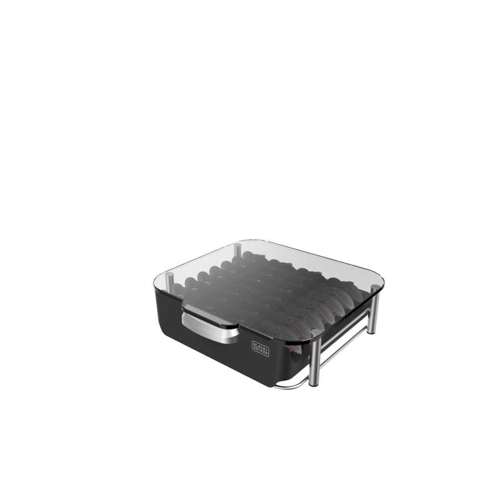 3/4 view of the bev by Black-and-decker™ cocktail maker sitting on top of an open filled capsule storage drawer